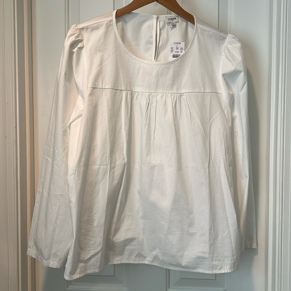 J. Crew women’s white cotton blouse with puff sleeve accent.